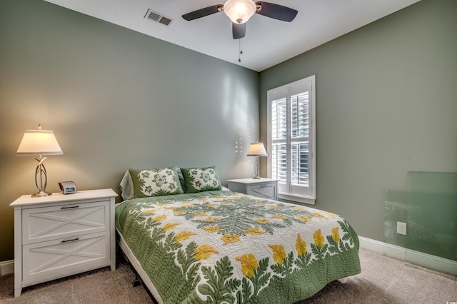 bedroom with carpet, baseboards, and ceiling fan