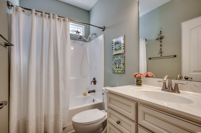 bathroom featuring vanity, toilet, and shower / tub combo with curtain