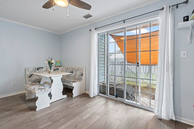 3008 Church St Unit D3, Myrtle Beach, SC 29577 - dining room featuring crown molding, wood finished floors, baseboards, and ceiling fan