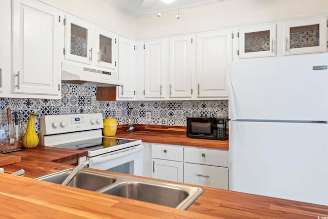 3008 Church St Unit D3, Myrtle Beach, SC 29577 - kitchen featuring white appliances, wooden counters, under cabinet range hood, white cabinets, and ornamental molding