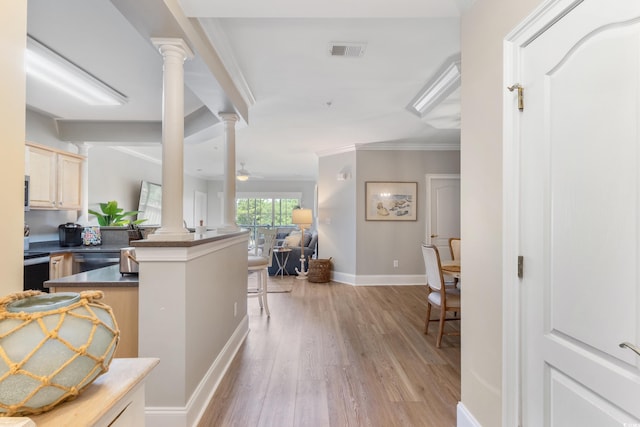 2180 Waterview Ln Unit 836, North Myrtle Beach, SC 29582 - hallway featuring ornate columns, light wood-type flooring, ornamental molding, and baseboards