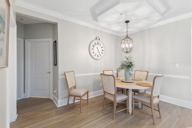 2180 Waterview Ln Unit 836, North Myrtle Beach, SC 29582 - dining area featuring light wood-style flooring, a chandelier, baseboards, and ornamental molding