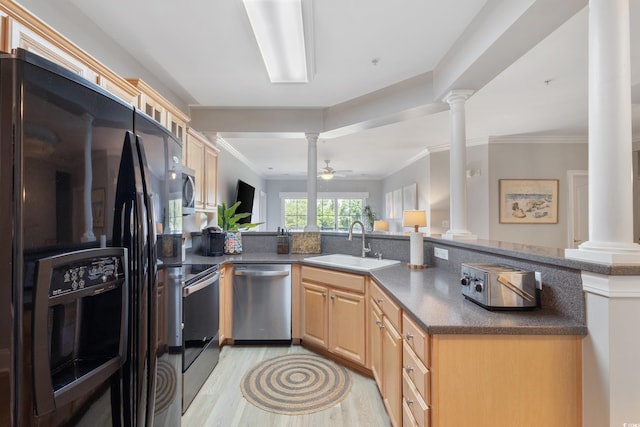 2180 Waterview Ln Unit 836, North Myrtle Beach, SC 29582 - kitchen with ornate columns, appliances with stainless steel finishes, a sink, light brown cabinetry, and ornamental molding