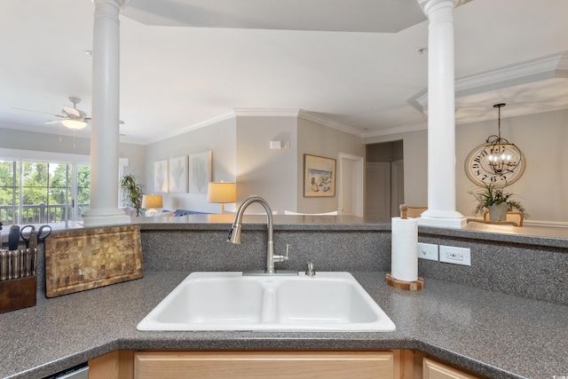 2180 Waterview Ln Unit 836, North Myrtle Beach, SC 29582 - kitchen featuring decorative columns, a sink, dark countertops, crown molding, and ceiling fan