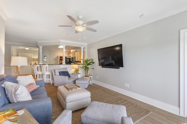 2180 Waterview Ln Unit 836, North Myrtle Beach, SC 29582 - living area with ceiling fan, decorative columns, ornamental molding, baseboards, and light wood-style floors