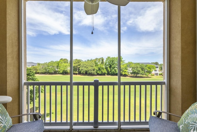 2180 Waterview Ln Unit 836, North Myrtle Beach, SC 29582 - sunroom / solarium featuring healthy amount of natural light, ceiling fan, and view of golf course