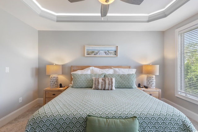 2180 Waterview Ln Unit 836, North Myrtle Beach, SC 29582 - bedroom with a tray ceiling, carpet floors, multiple windows, baseboards, and crown molding