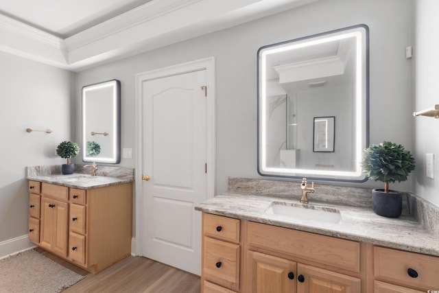2180 Waterview Ln Unit 836, North Myrtle Beach, SC 29582 - bathroom featuring wood finished floors, two vanities, and crown molding