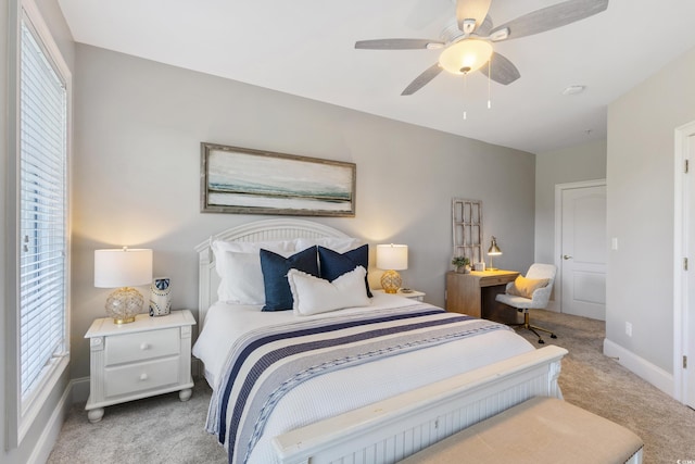 2180 Waterview Ln Unit 836, North Myrtle Beach, SC 29582 - bedroom with light carpet, multiple windows, baseboards, and ceiling fan