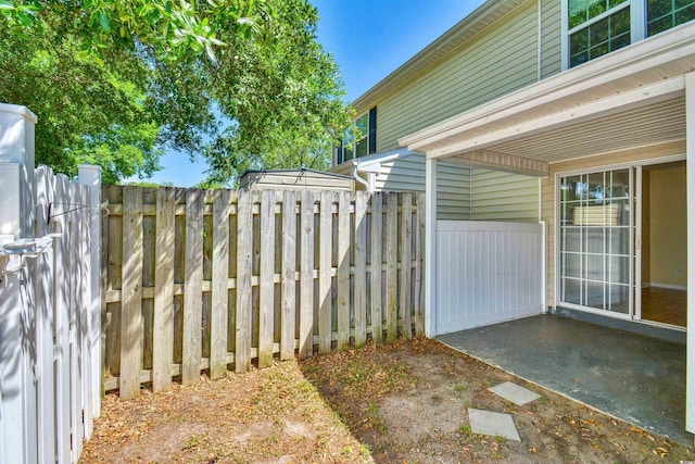 view of patio featuring fence