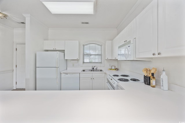 kitchen featuring white appliances, crown molding, light countertops, a sink, and white cabinets