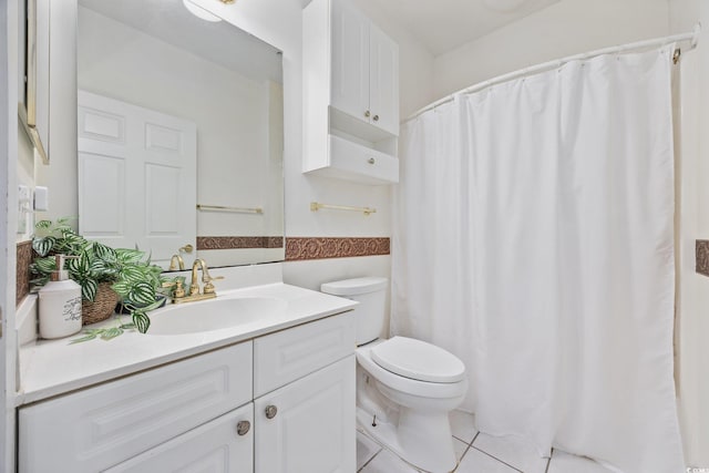 full bathroom featuring toilet, tile patterned flooring, vanity, and a shower with shower curtain