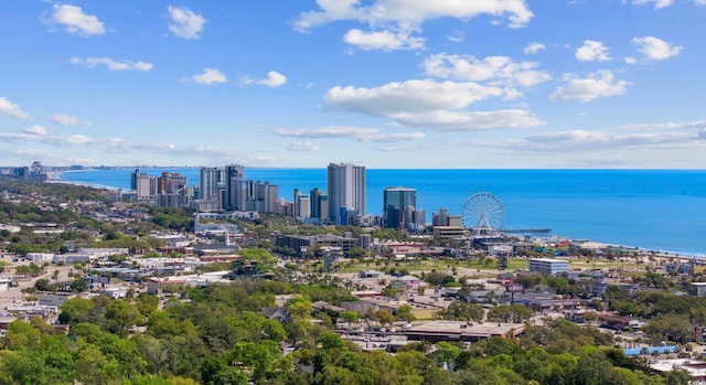 view of urban area featuring a large body of water