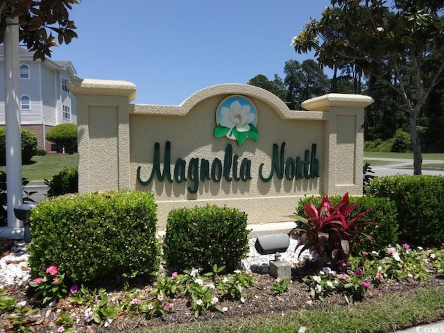view of community sign