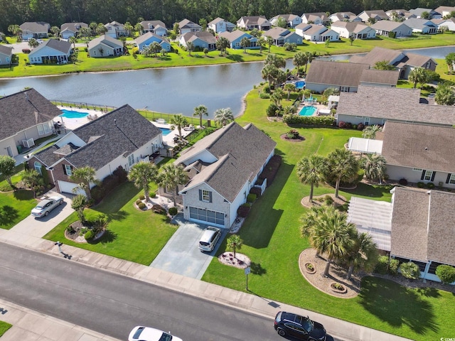 347 Kessinger Dr, Surfside Beach, SC 29575 - aerial view of residential area with a large body of water and a pool area