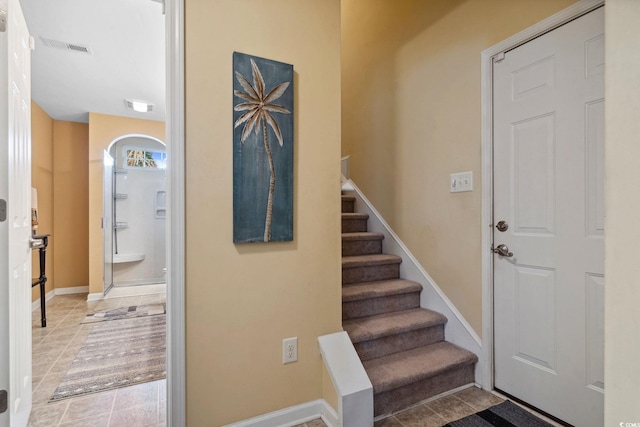 347 Kessinger Dr, Surfside Beach, SC 29575 - tiled foyer with stairway and baseboards