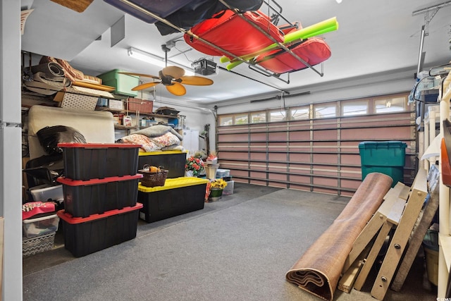 347 Kessinger Dr, Surfside Beach, SC 29575 - garage featuring a garage door opener and a ceiling fan