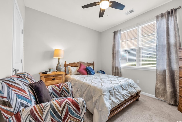 bedroom featuring carpet flooring, baseboards, and ceiling fan