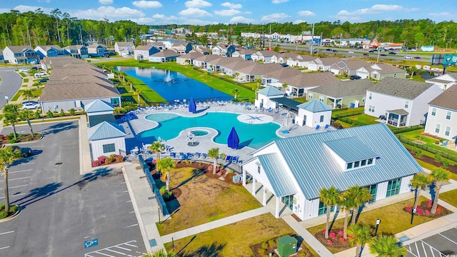 bird's eye view of a large body of water and a pool area