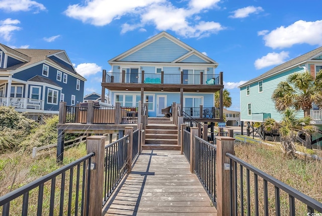 969 S Waccamaw Dr, Garden City Beach, SC 29576 - rear view of property with a balcony