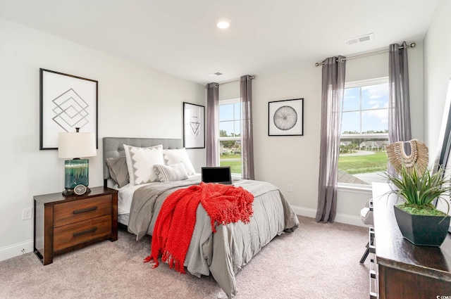 814 Belle Dr, North Myrtle Beach, SC 29582 - bedroom featuring baseboards, light colored carpet, and recessed lighting