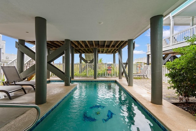 17 N Seaside Dr, Surfside Beach, SC 29575 - view of swimming pool with stairway and a patio area