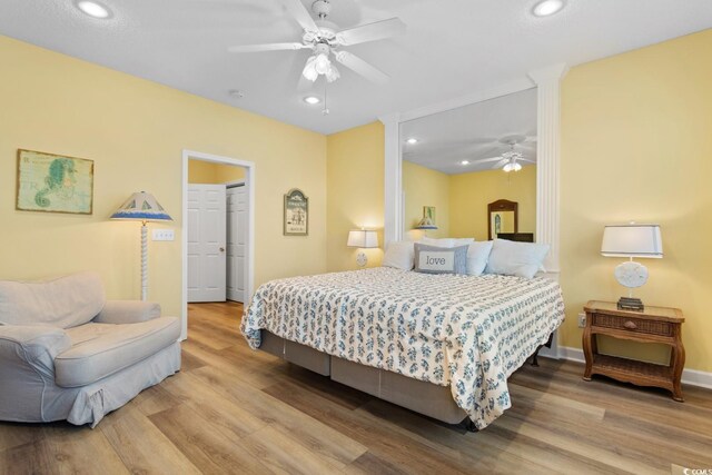 17 N Seaside Dr, Surfside Beach, SC 29575 - bedroom featuring wood finished floors, ceiling fan, recessed lighting, and baseboards