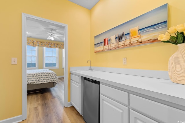 17 N Seaside Dr, Surfside Beach, SC 29575 - ensuite bathroom with double vanity, toilet, enclosed tub / shower combo, ceiling fan, and tile patterned flooring