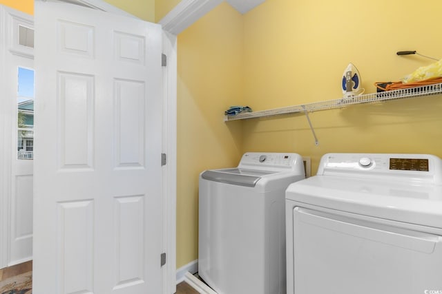 17 N Seaside Dr, Surfside Beach, SC 29575 - clothes washing area featuring independent washer and dryer
