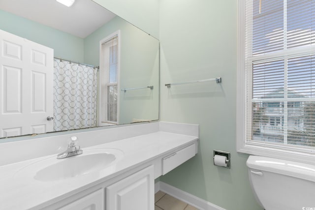 17 N Seaside Dr, Surfside Beach, SC 29575 - full bathroom with vanity, toilet, tile patterned floors, and baseboards