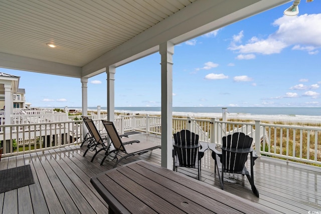 17 N Seaside Dr, Surfside Beach, SC 29575 - wooden deck featuring view of water and beach