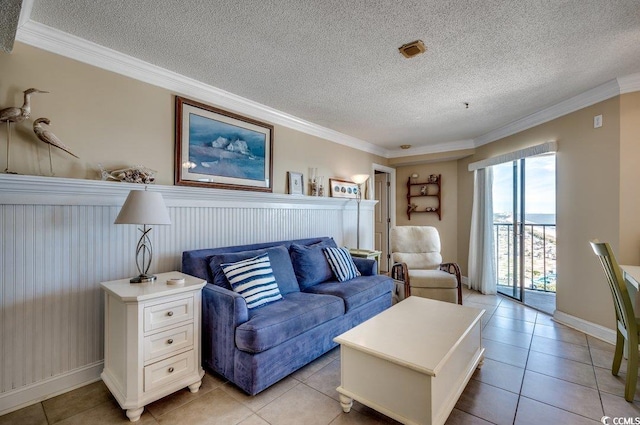 5905 S Kings Hwy Unit 1717, Myrtle Beach, SC 29575 - living area featuring light tile patterned flooring, crown molding, a textured ceiling, and baseboards
