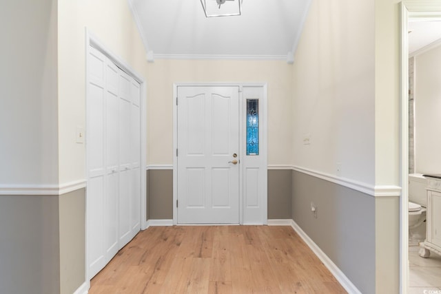 8207 Timber Ridge Rd, Conway, SC 29526 - foyer featuring light wood-type flooring, crown molding, and baseboards