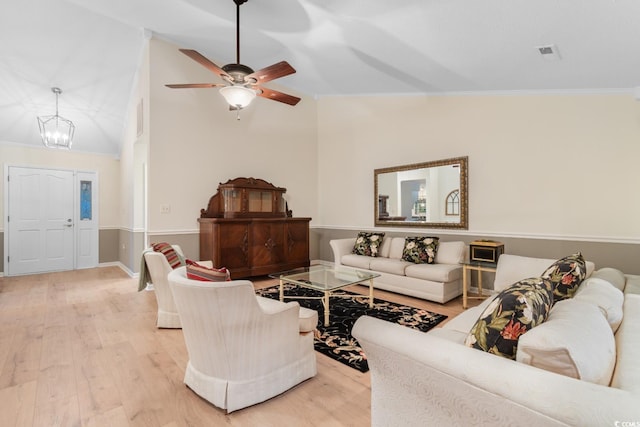 8207 Timber Ridge Rd, Conway, SC 29526 - living area with light wood finished floors, ornamental molding, ceiling fan, a chandelier, and high vaulted ceiling