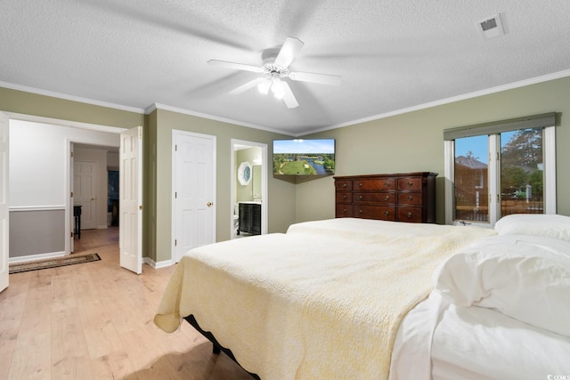 8207 Timber Ridge Rd, Conway, SC 29526 - bedroom with light wood finished floors, baseboards, ornamental molding, a textured ceiling, and ceiling fan