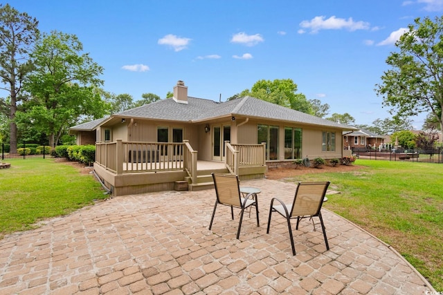 8207 Timber Ridge Rd, Conway, SC 29526 - back of house with a patio area, a chimney, a deck, and a shingled roof