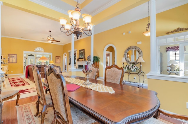 4608 Grovecrest Cir N, Myrtle Beach, SC 29582 - dining area with ceiling fan, crown molding, wood finished floors, a chandelier, and baseboards