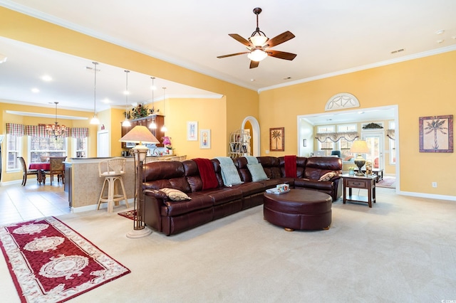 4608 Grovecrest Cir N, Myrtle Beach, SC 29582 - living room with crown molding, plenty of natural light, baseboards, a ceiling fan, and a chandelier