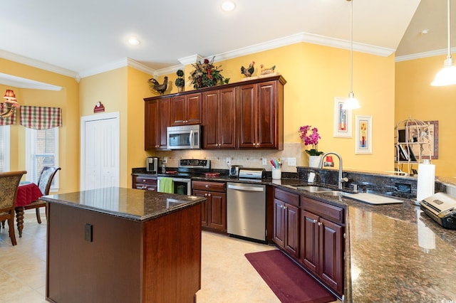 4608 Grovecrest Cir N, Myrtle Beach, SC 29582 - kitchen featuring appliances with stainless steel finishes, a sink, ornamental molding, light tile patterned flooring, and decorative light fixtures