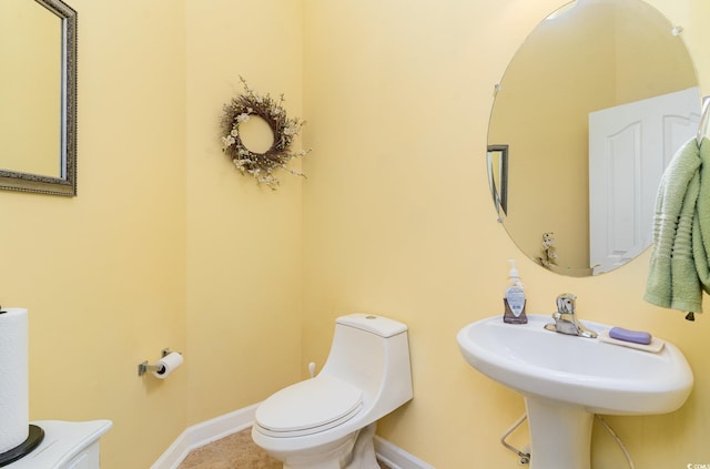 4608 Grovecrest Cir N, Myrtle Beach, SC 29582 - bathroom with baseboards, toilet, tile patterned flooring, and a sink