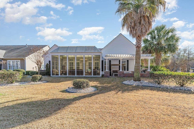 4608 Grovecrest Cir N, Myrtle Beach, SC 29582 - rear view of house featuring a pergola, a sunroom, and a yard