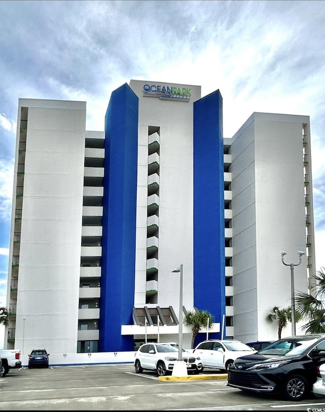 1905 S Ocean Blvd Unit 922-924, Myrtle Beach, SC 29577 - view of property featuring uncovered parking