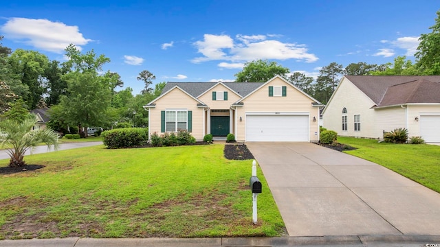 9831 Winchester Ct, Murrells Inlet, SC 29576 - traditional home with driveway, a front lawn, and an attached garage