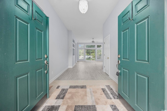 9831 Winchester Ct, Murrells Inlet, SC 29576 - entryway with ceiling fan and light tile patterned floors