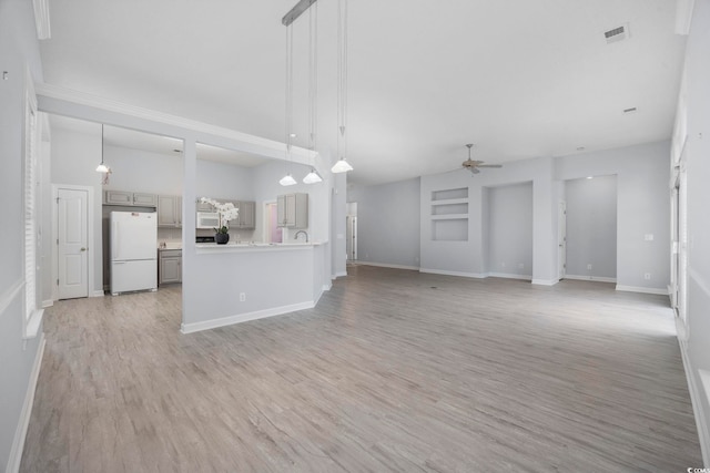 9831 Winchester Ct, Murrells Inlet, SC 29576 - unfurnished living room with ceiling fan and light wood-type flooring