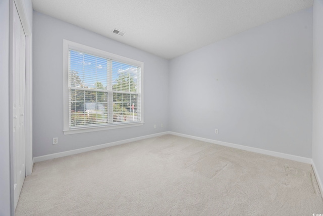 9831 Winchester Ct, Murrells Inlet, SC 29576 - empty room with light carpet