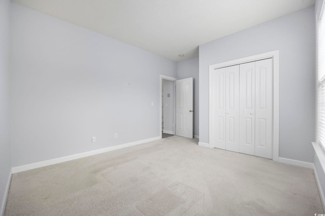 9831 Winchester Ct, Murrells Inlet, SC 29576 - unfurnished bedroom featuring carpet flooring and a closet