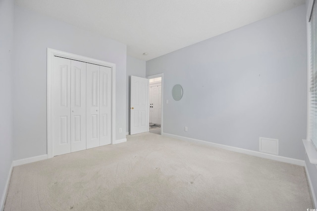 9831 Winchester Ct, Murrells Inlet, SC 29576 - unfurnished bedroom with carpet and a closet