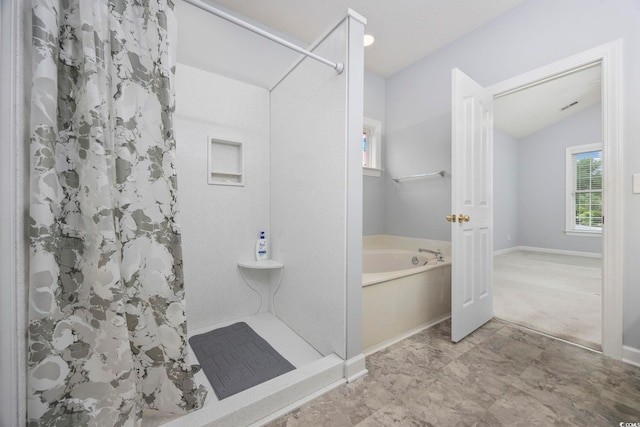 9831 Winchester Ct, Murrells Inlet, SC 29576 - bathroom featuring a shower stall, a garden tub, and lofted ceiling