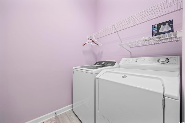9831 Winchester Ct, Murrells Inlet, SC 29576 - laundry room featuring independent washer and dryer and light wood finished floors